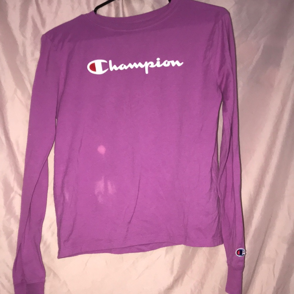 Purple champion long sleeve Tee. Has a little bleach stain but is lightly worn.